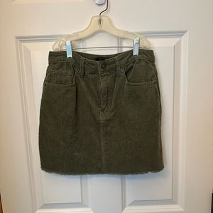 Olive corduroy miniskirt with fringe hem. Forever 21 size small